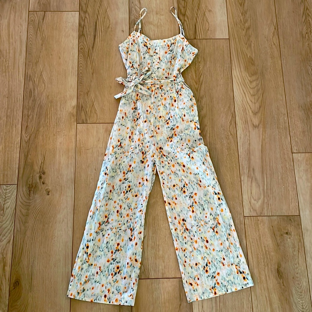 Tart Floral jumpsuit romper size small adjustable straps and detachable belt.